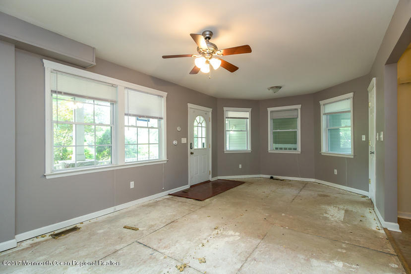799 Leonardville Road Leonardo, NJ 07737 - Photo 6 of 25 a view of an empty room with a window