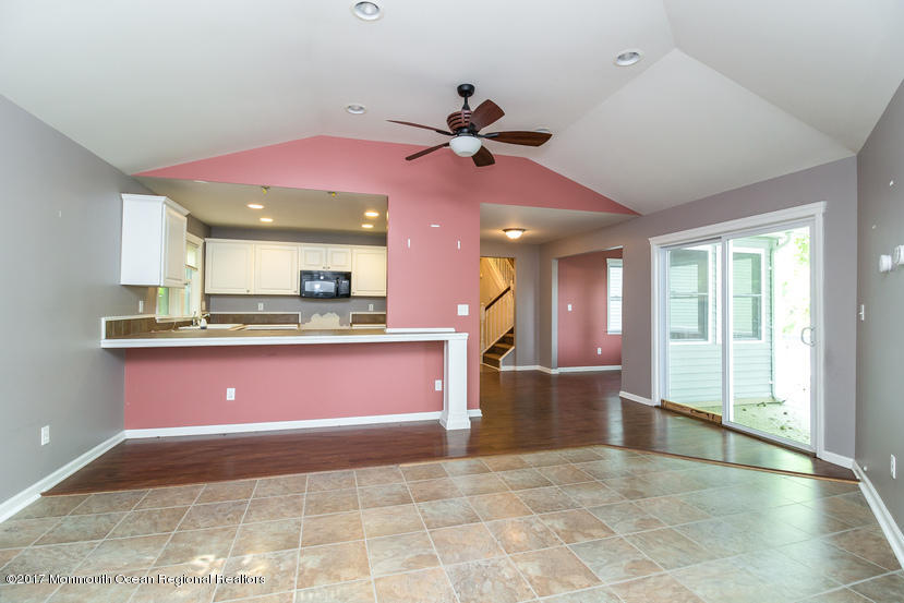 799 Leonardville Road Leonardo, NJ 07737 - Photo 9 of 25 a kitchen with stainless steel appliances kitchen island granite countertop cabinets and a counter top space