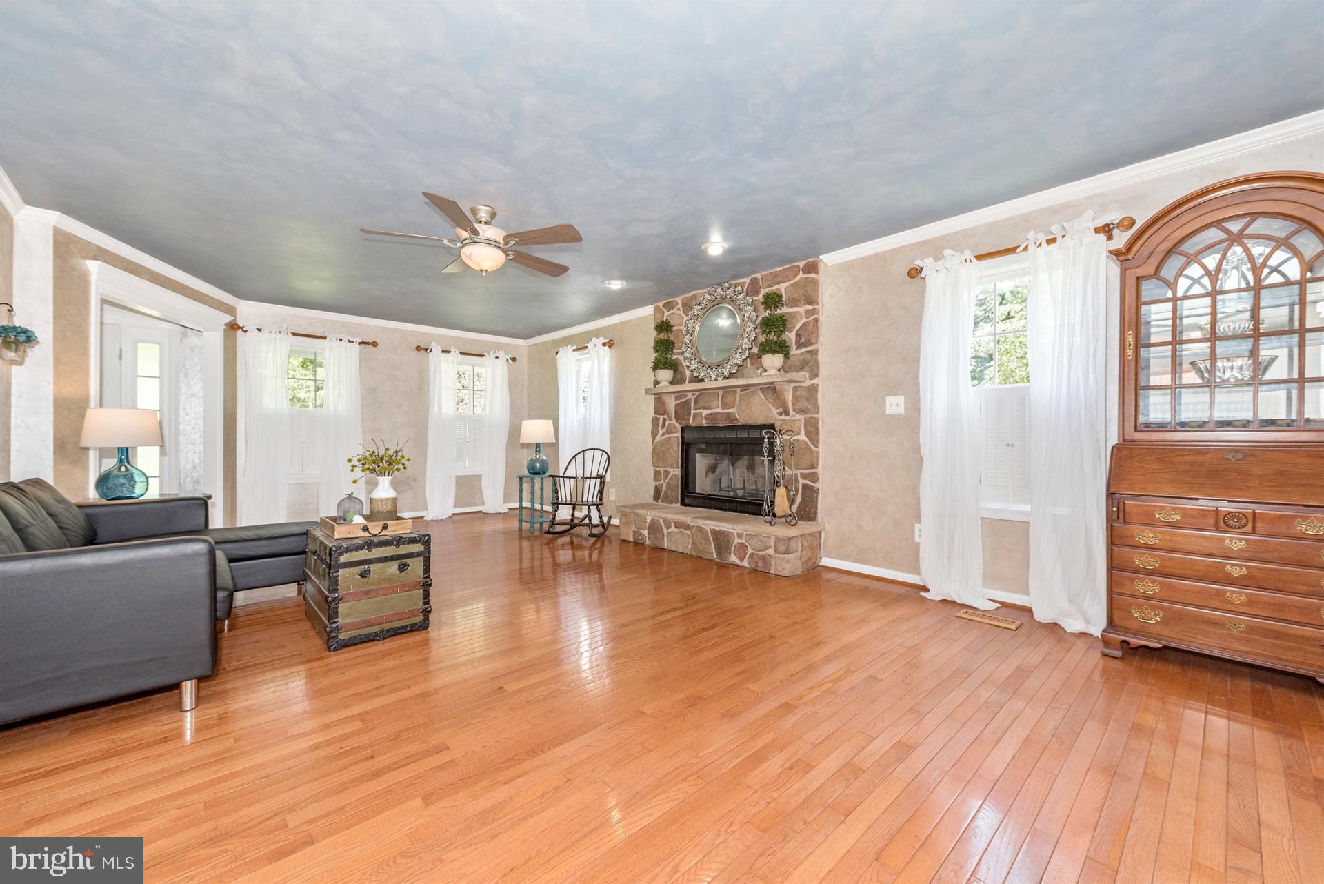 11217 Coppermine Road Woodsboro, MD 21798 - Photo 12 of 30 Open Concept Living Room With Wood Fire Place
