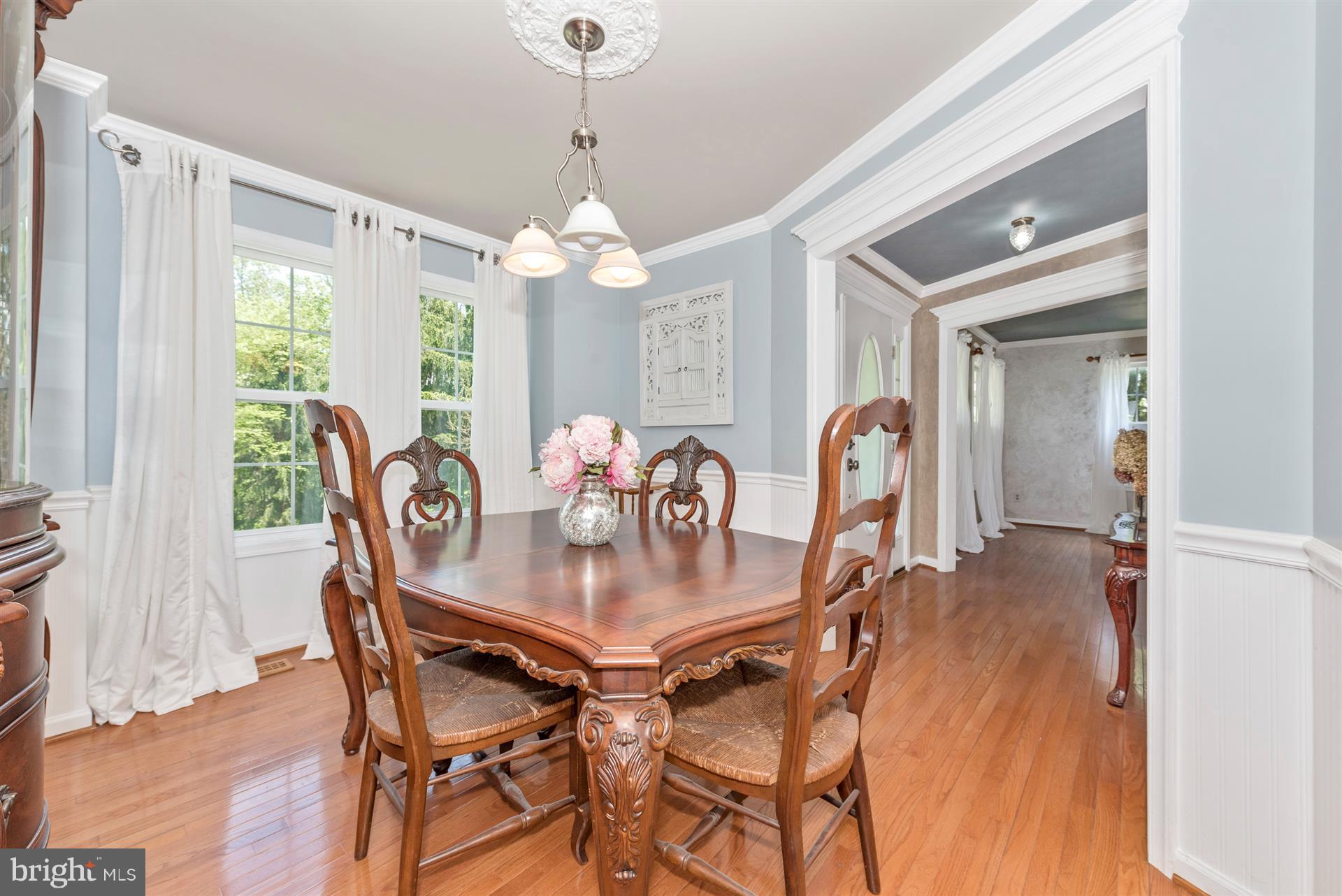 11217 Coppermine Road Woodsboro, MD 21798 - Photo 5 of 30 Dining Room With Wainscoting and Crown Molding