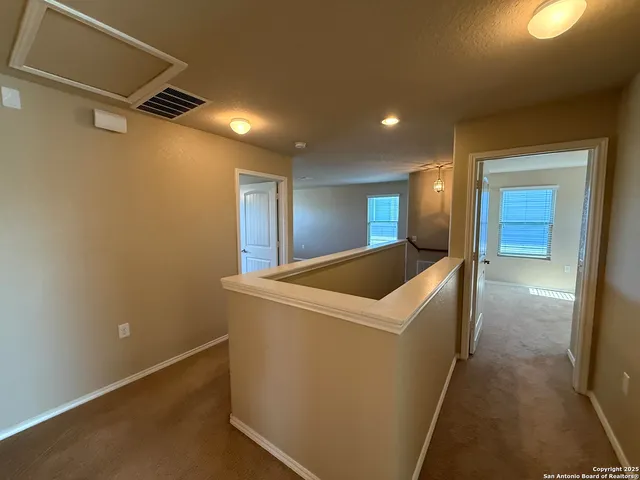 a view of hallway with window