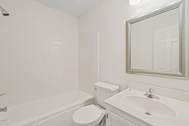 a bathroom with a sink toilet and bathtub
