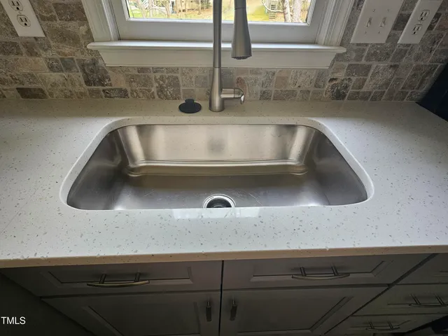 a close view of sink and tap