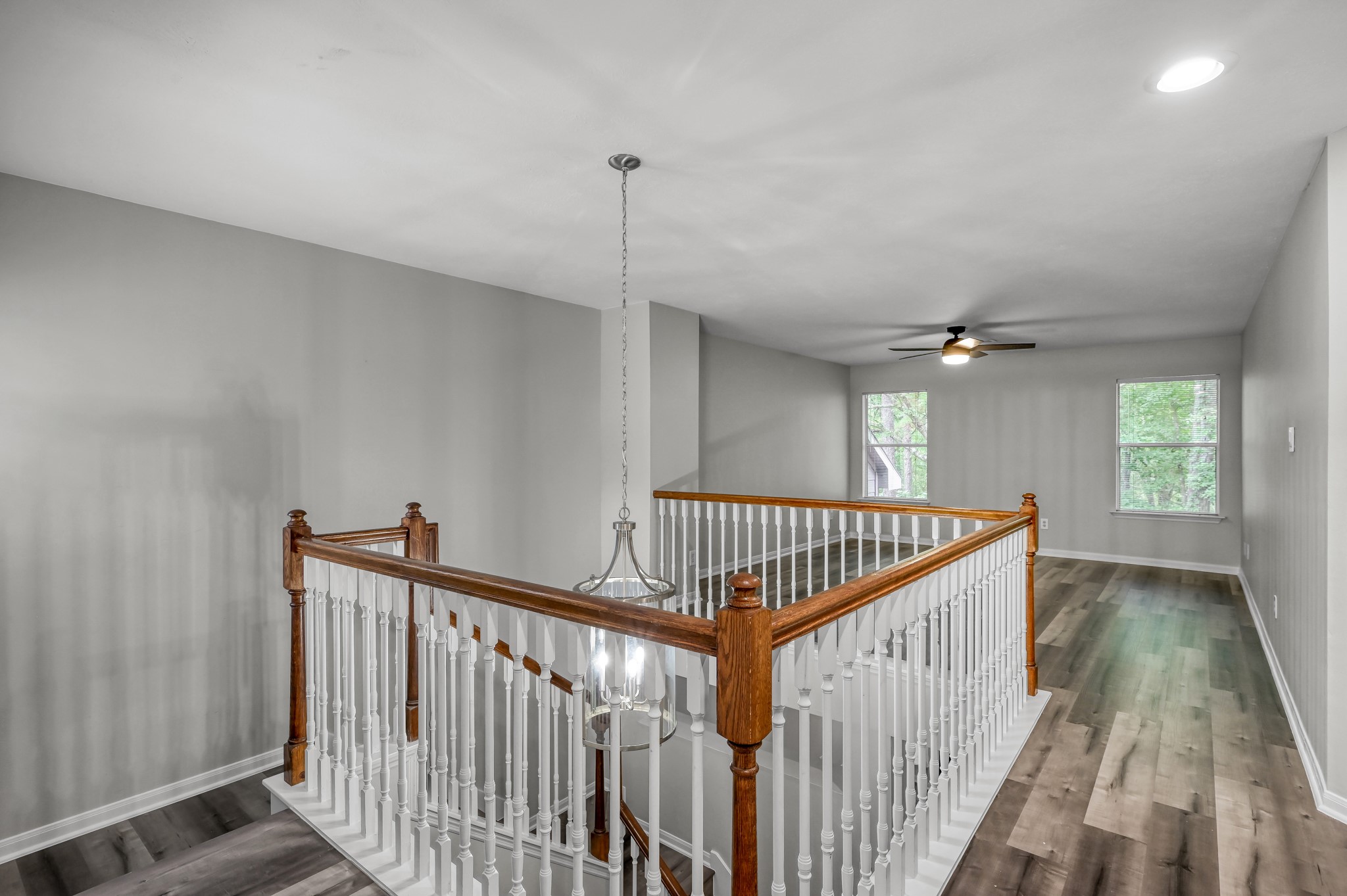 23 Alderon Woods Place Spring, TX 77382 - Photo 15 of 25 a view of hallway with wooden floor