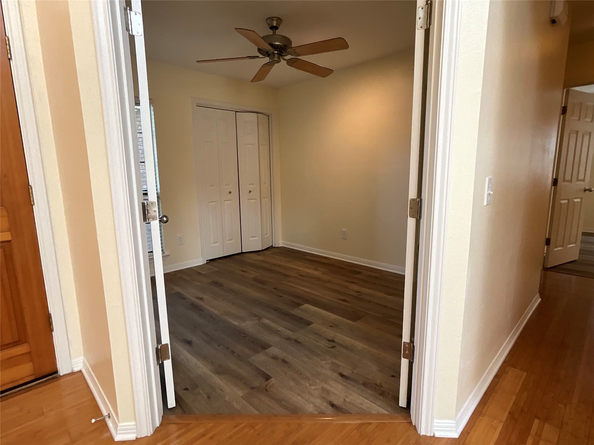 15702 Racine Cove Austin, TX 78717 - Photo 23 of 27 Office or bedroom option. A well-lit secondary room provides comfortable living with modern flooring and essential ceiling features.