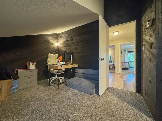 a sitting area with furniture and a table