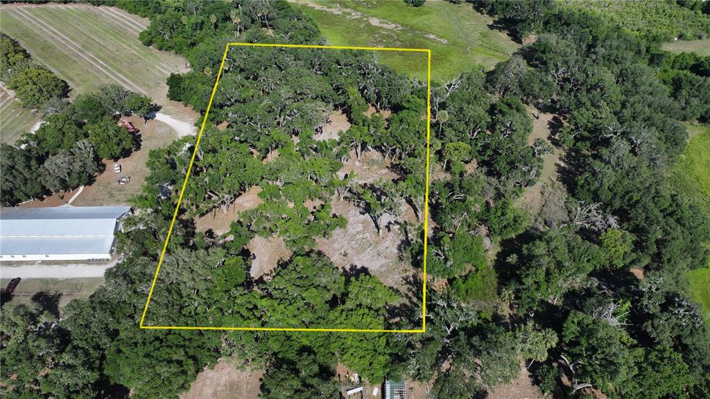 Muck Pond Road Seffner, FL 33584 - Photo 5 of 13 an aerial view of a residential houses with outdoor space and street view