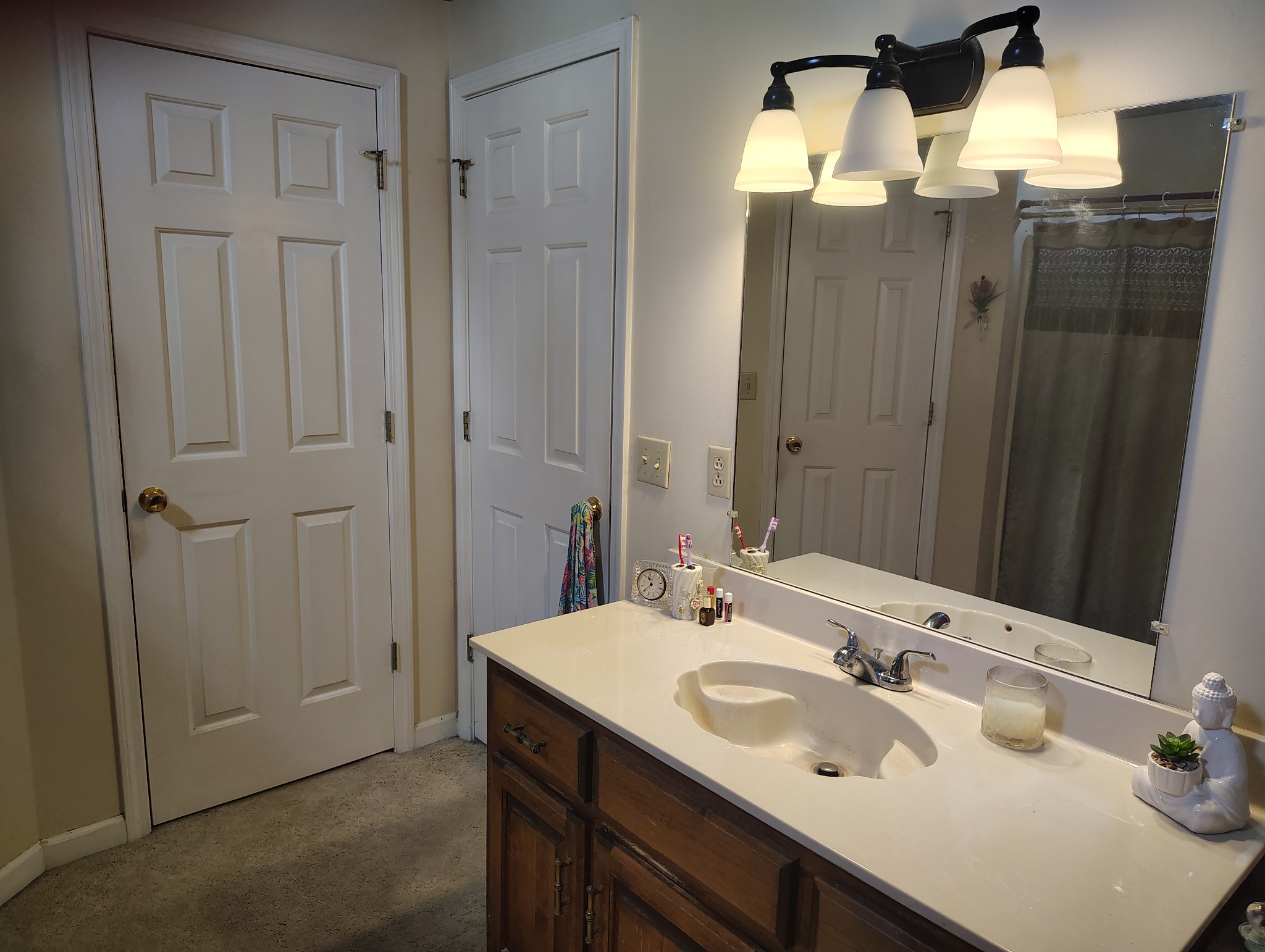 29 Bluebird Lane Lafayette, TN 37083 - Photo 13 of 17 a bathroom with a double vanity sink and mirror