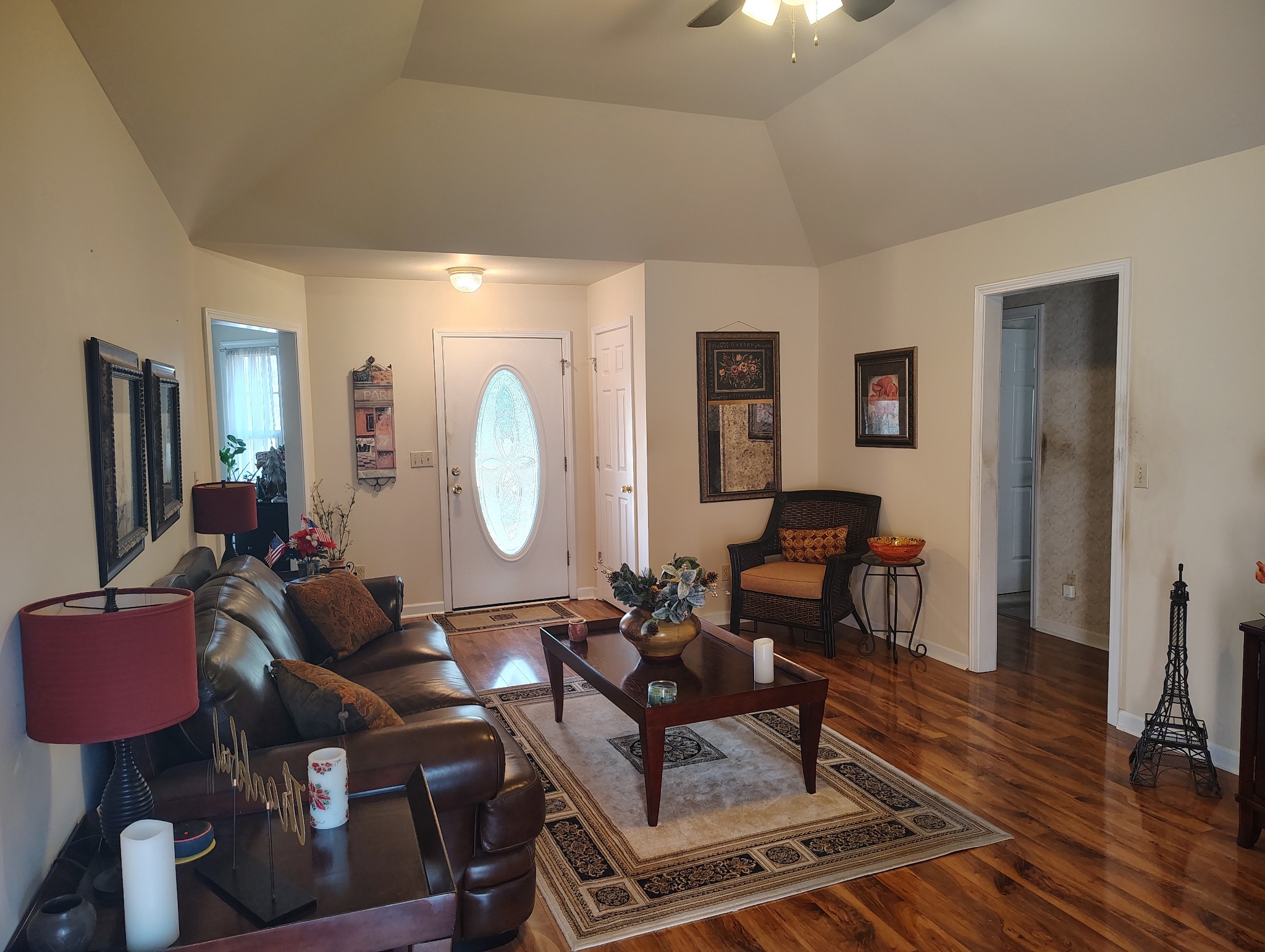 29 Bluebird Lane Lafayette, TN 37083 - Photo 8 of 17 a living room with furniture a large window and a wooden floor