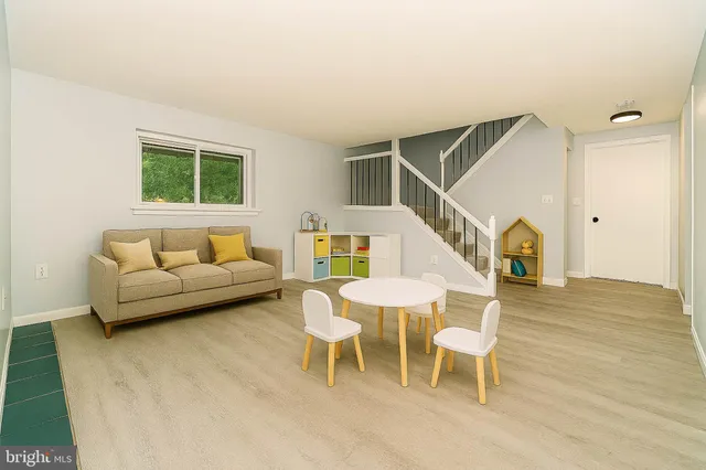 a view of entryway with wooden floor