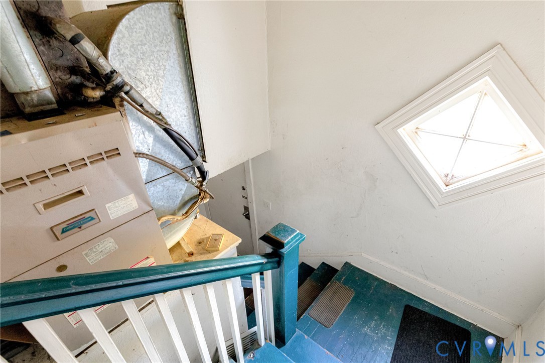 3301 Main Street Petersburg, VA 23803 - Photo 16 of 18 a view of staircase with wooden floor and a window