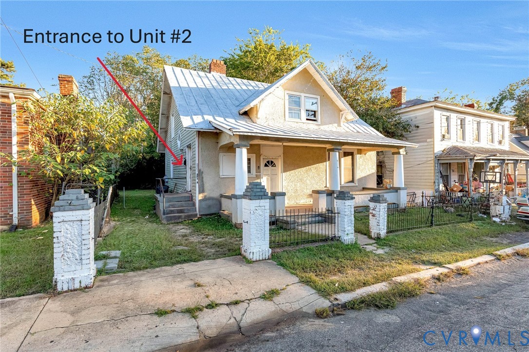 3301 Main Street Petersburg, VA 23803 - Photo 18 of 18 a front view of a house with garden