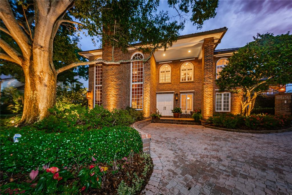 Welcome to the dream home you deserve, both stately and featuring tropical elegance.