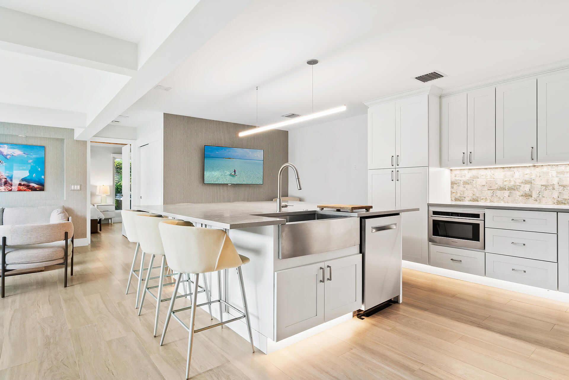 Undisclosed Address Jupiter, FL 33477 - Photo 13 of 107 a kitchen with granite countertop a sink cabinets and stainless steel appliances