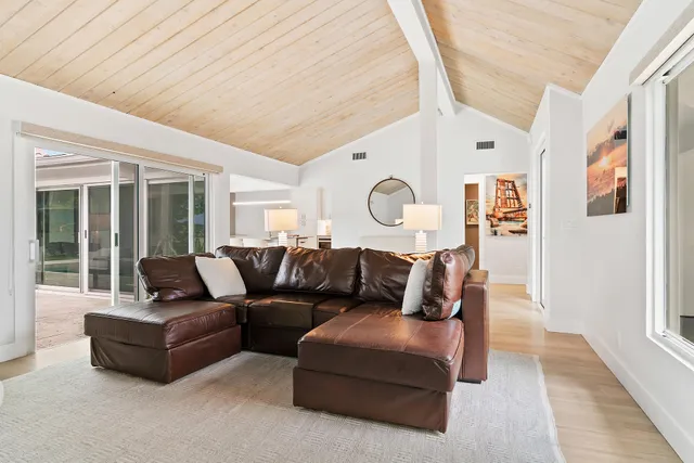 a view of workspace with furniture and window