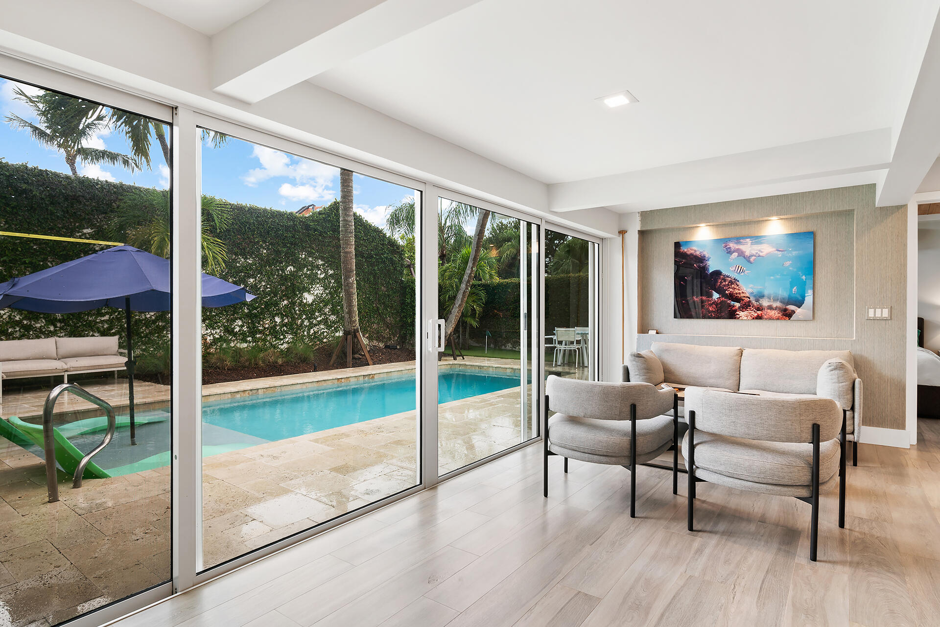 Undisclosed Address Jupiter, FL 33477 - Photo 24 of 107 a living room with furniture and a floor to ceiling window