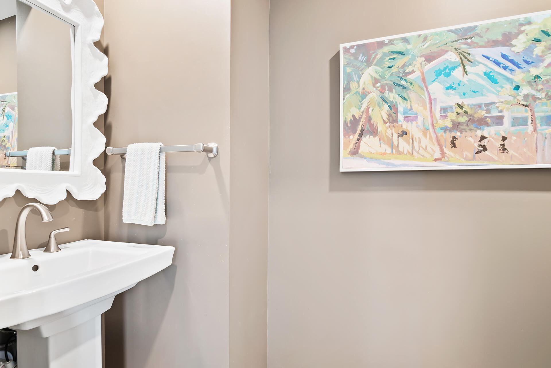 Undisclosed Address Jupiter, FL 33477 - Photo 25 of 107 a bathroom with a sink and a mirror