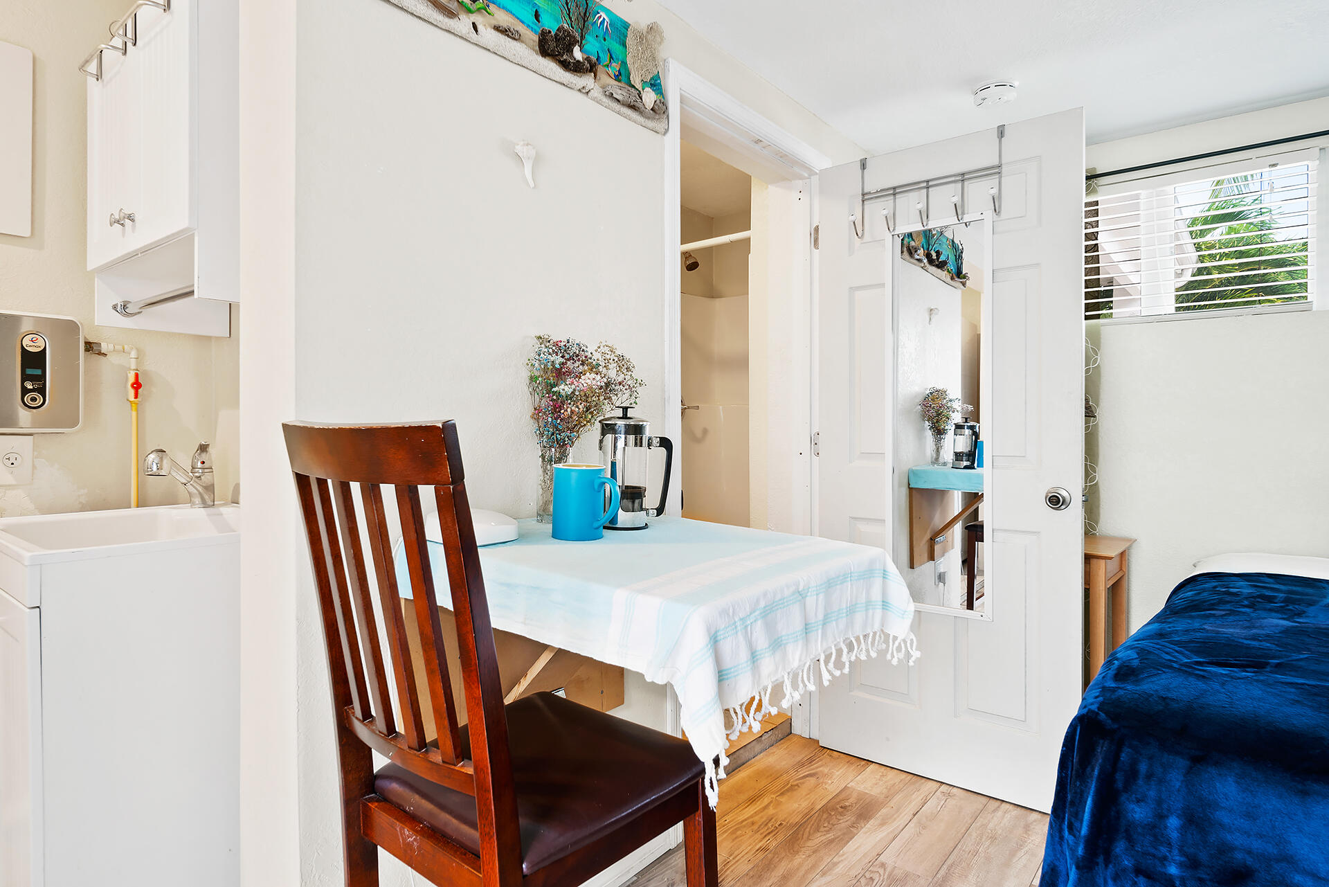 Undisclosed Address Jupiter, FL 33477 - Photo 56 of 107 a living room with furniture and wooden floor