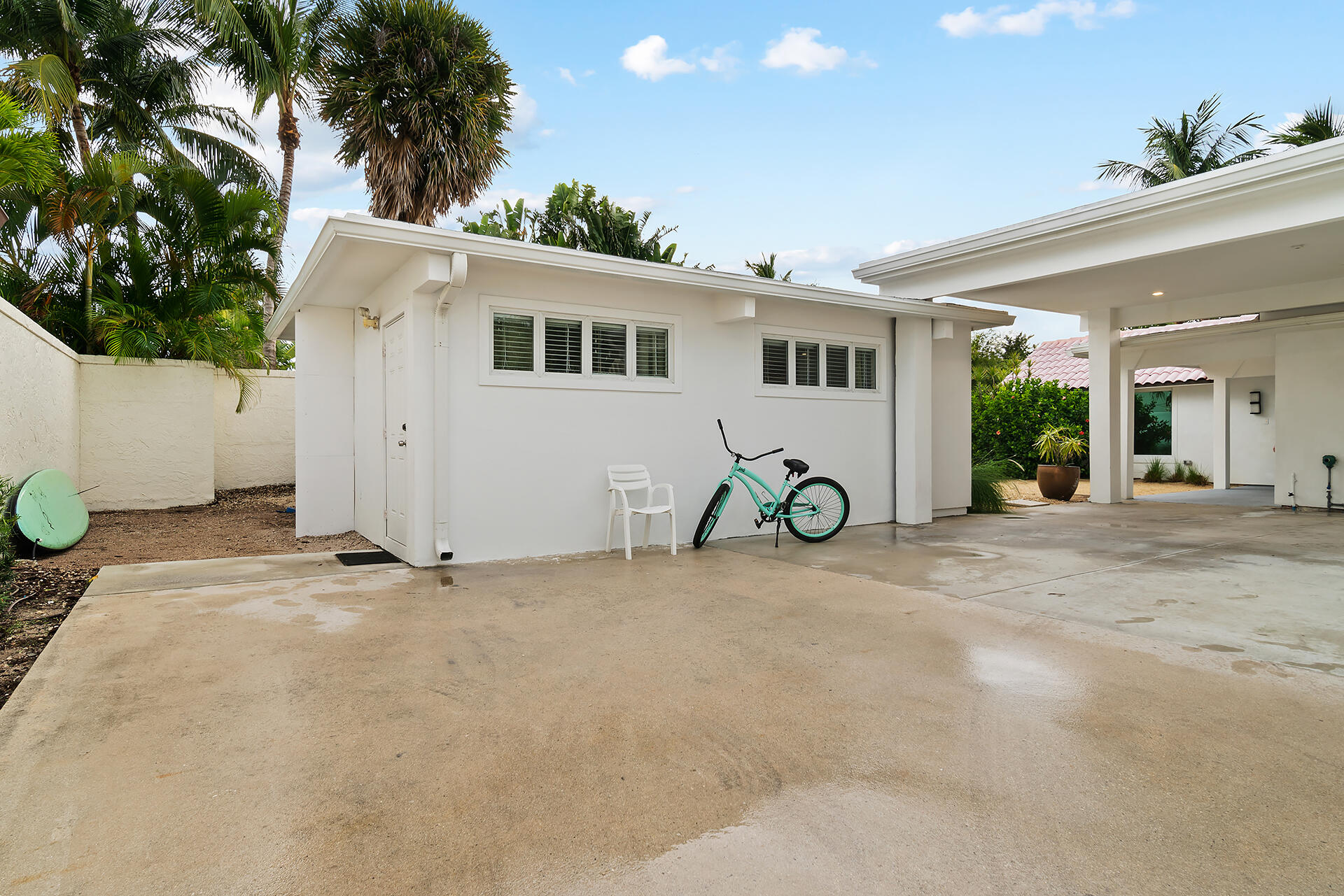 Undisclosed Address Jupiter, FL 33477 - Photo 58 of 107 a view of a house with a patio