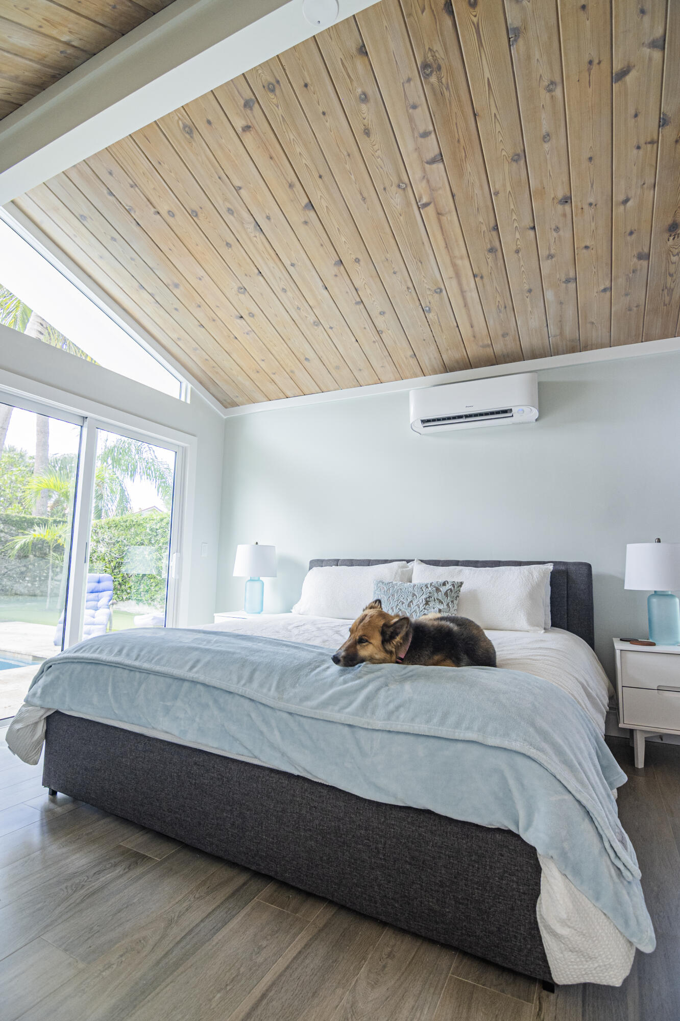 Undisclosed Address Jupiter, FL 33477 - Photo 67 of 107 a bedroom with a bed and a window