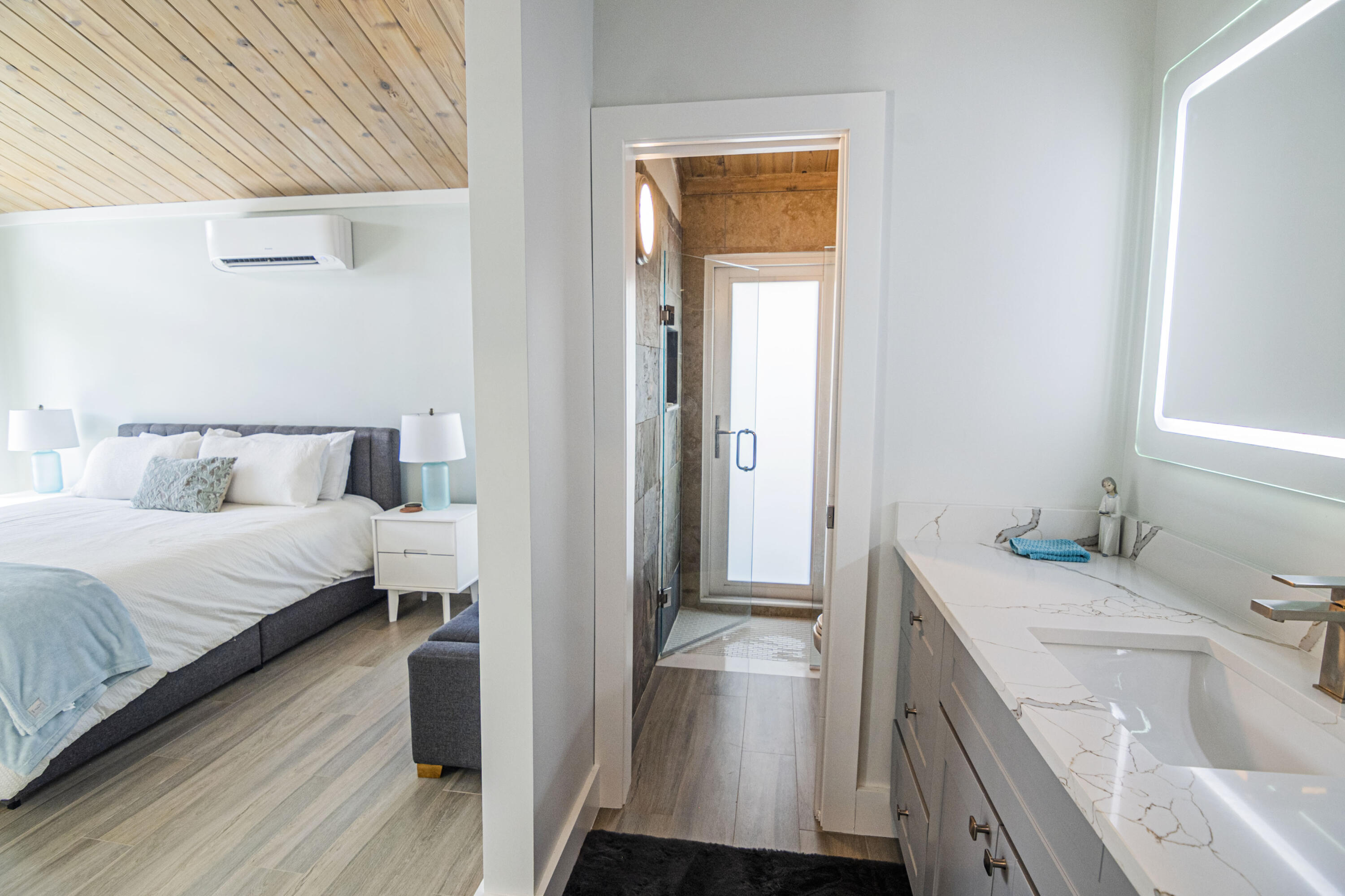 Undisclosed Address Jupiter, FL 33477 - Photo 68 of 107 a bathroom with a sink and a mirror