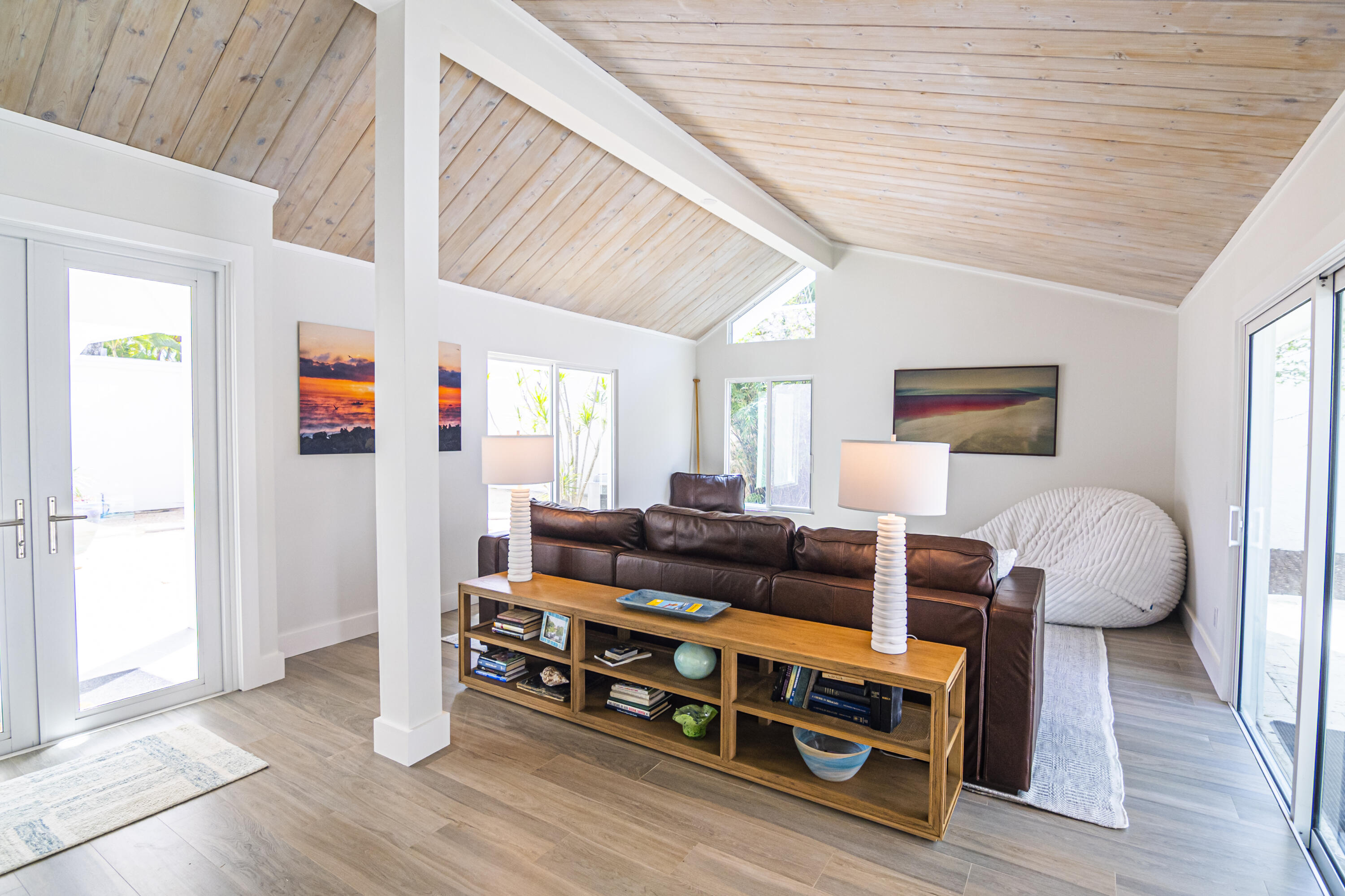 Undisclosed Address Jupiter, FL 33477 - Photo 77 of 107 a living room with furniture and wooden floor