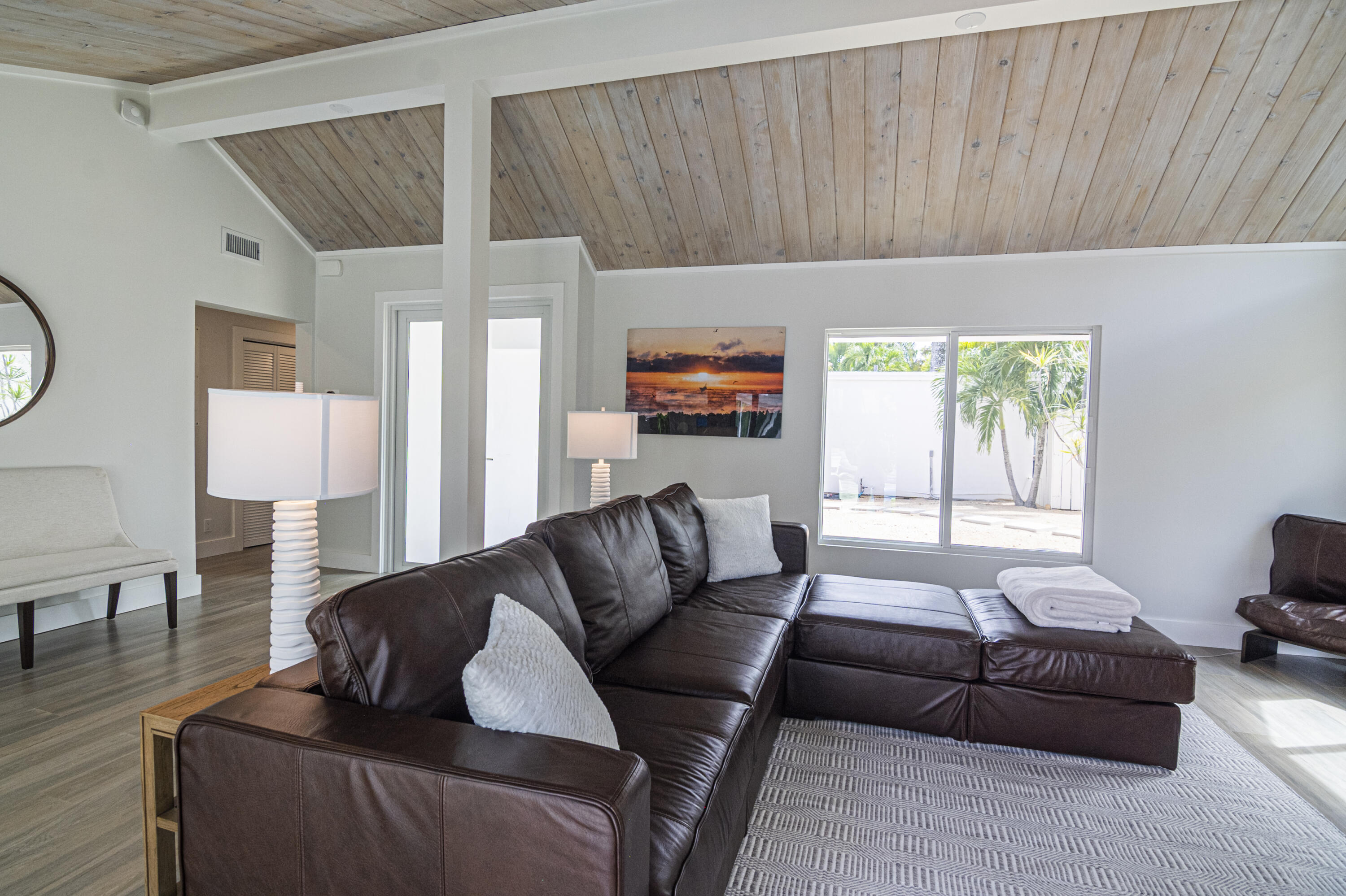 Undisclosed Address Jupiter, FL 33477 - Photo 78 of 107 a living room with furniture and a couch
