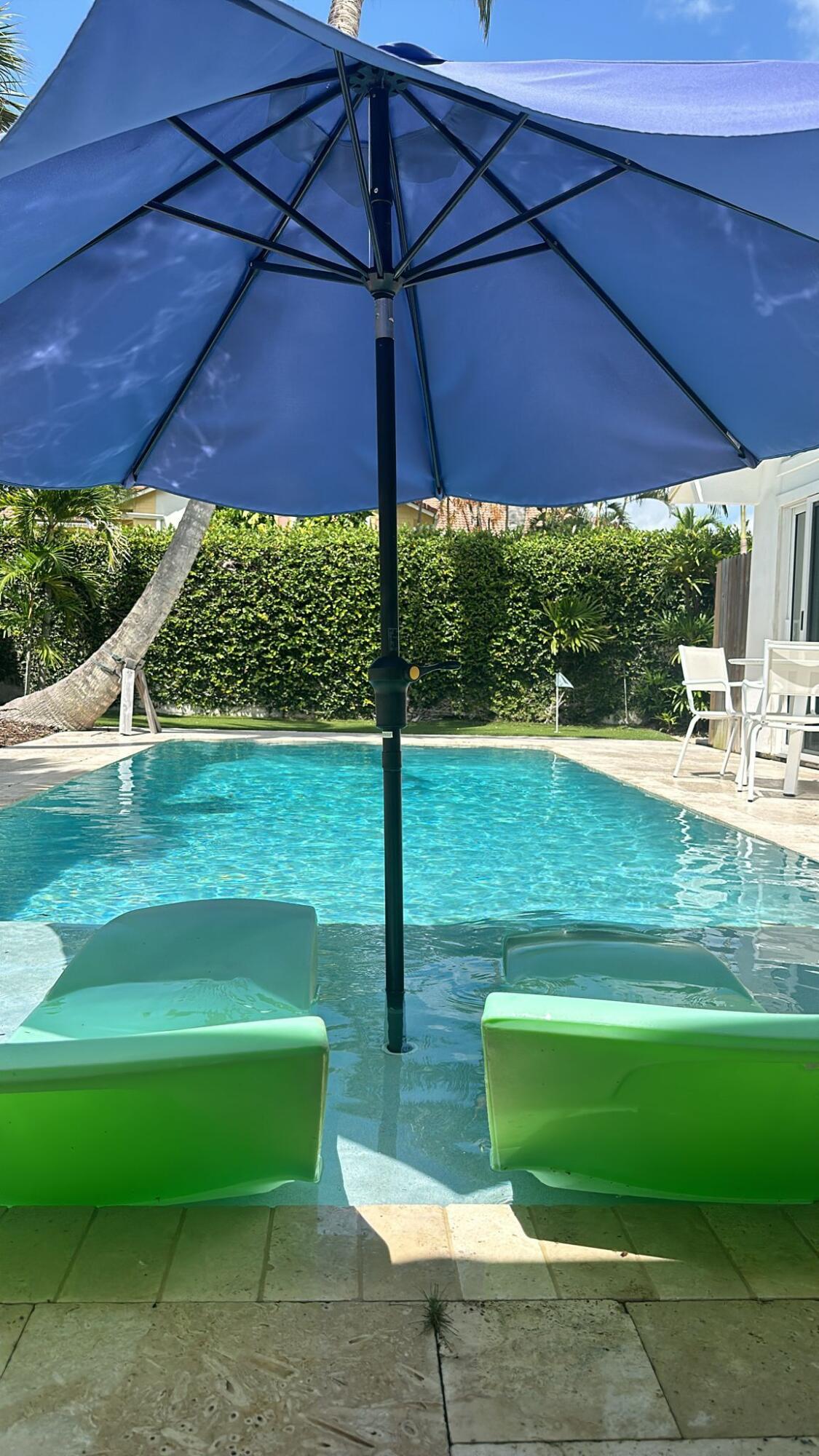 Undisclosed Address Jupiter, FL 33477 - Photo 93 of 107 Lounge chairs on sunshelf