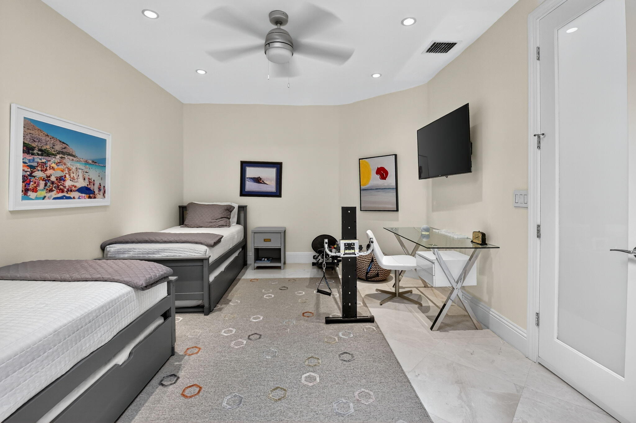 2563 Northwest 63rd Street Boca Raton, FL 33496 - Photo 36 of 65 a living room with furniture and a flat screen tv