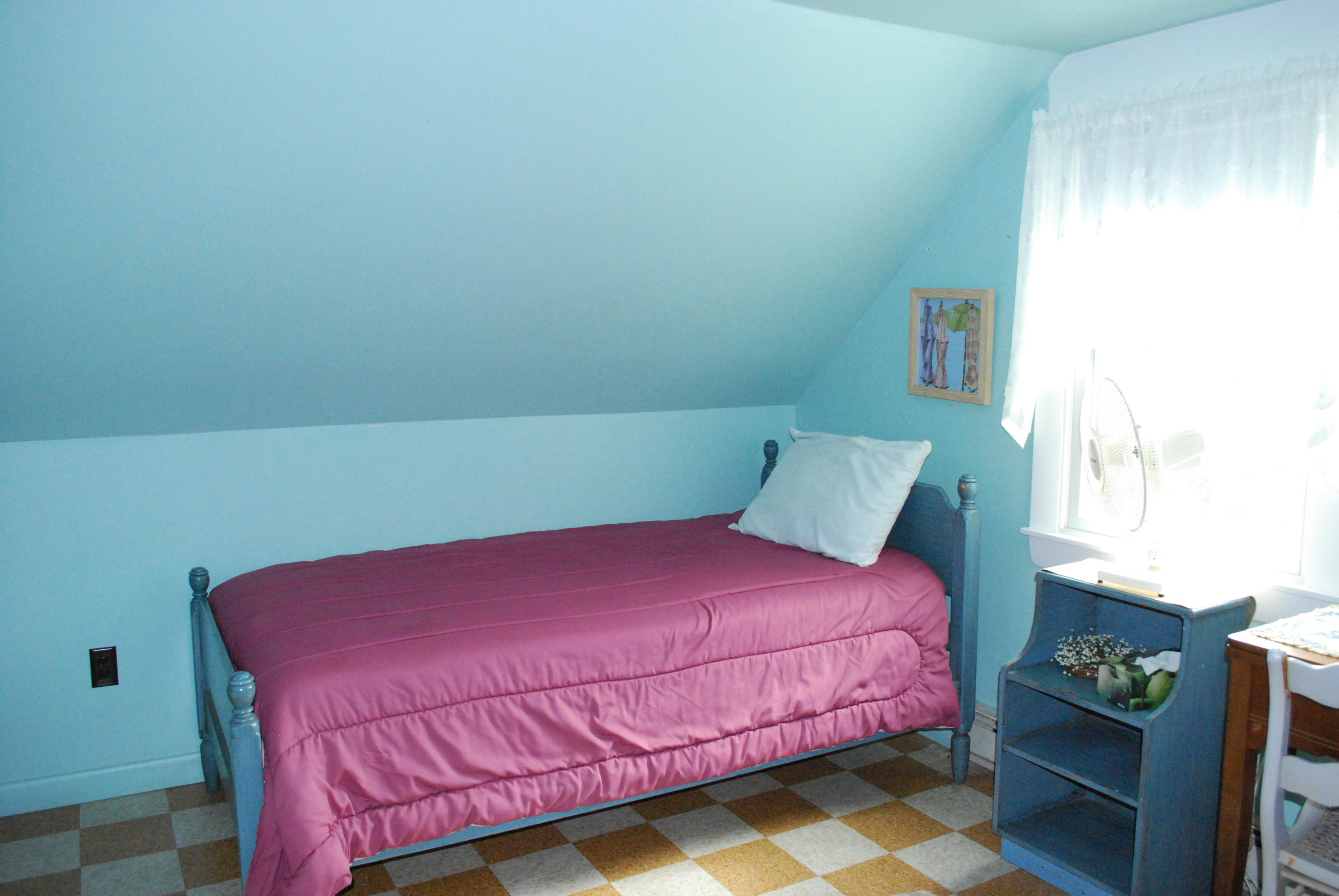 29 Cordwood Road Mashpee, MA 02649 - Photo 16 of 20 a bed sitting in a bedroom next to a window