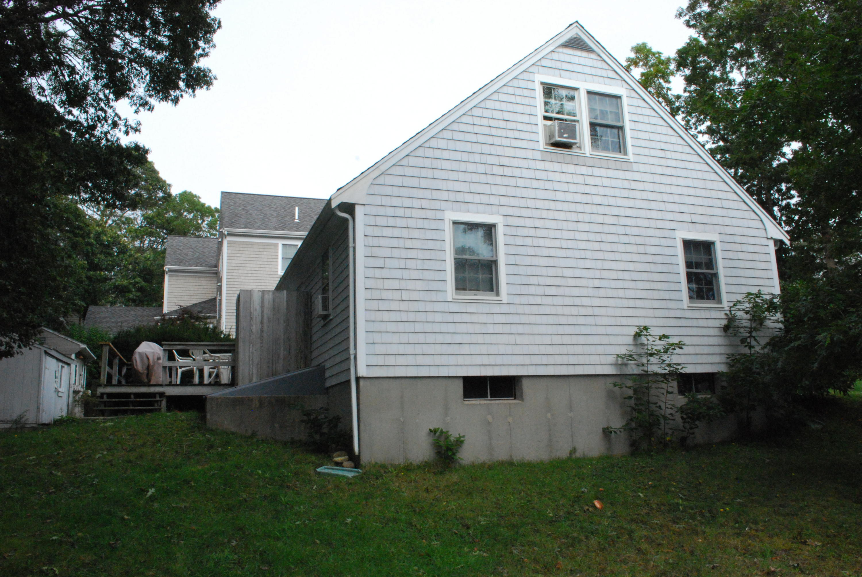29 Cordwood Road Mashpee, MA 02649 - Photo 19 of 20 a view of backyard with a garden and plants