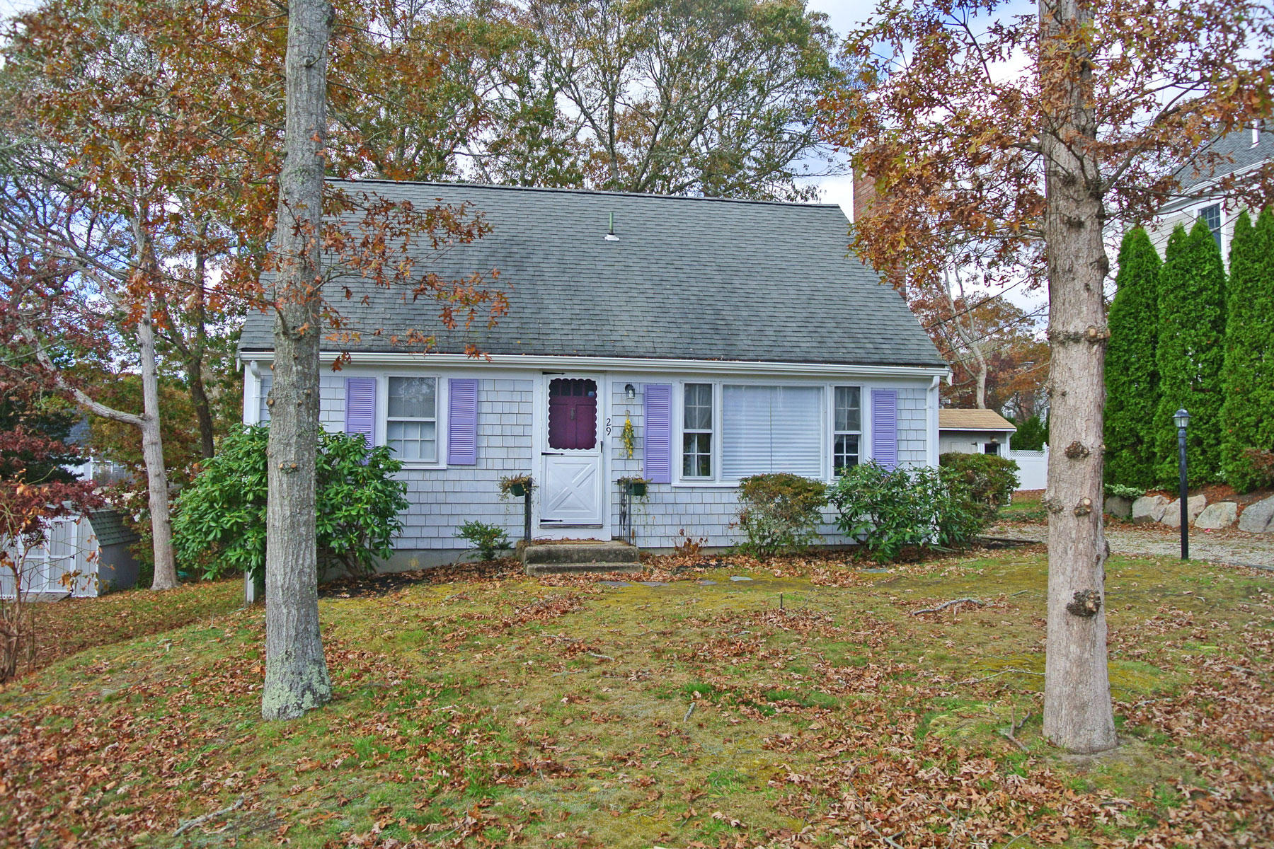 29 Cordwood Road Mashpee, MA 02649 - Photo 2 of 20 front view of a house with a yard