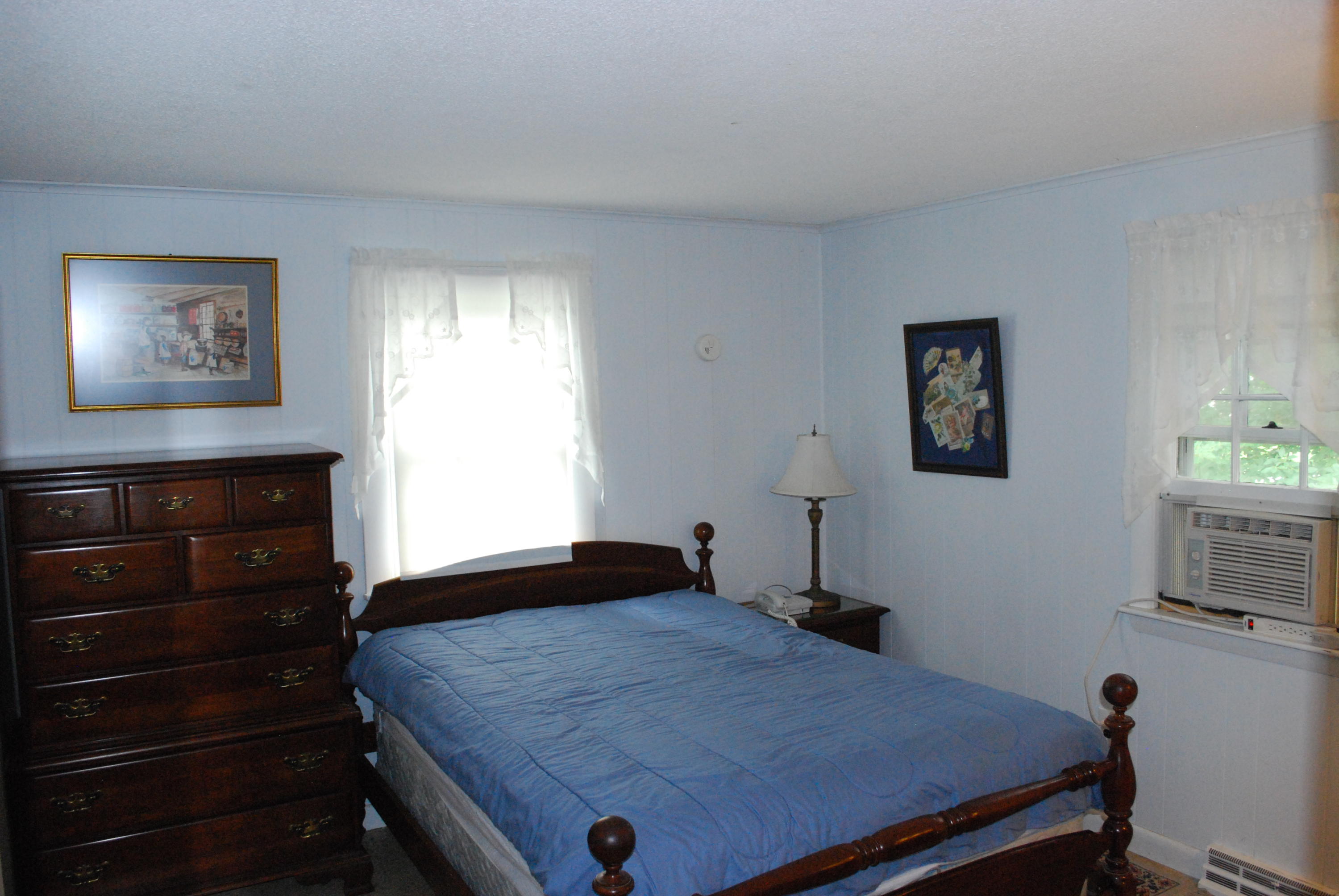 29 Cordwood Road Mashpee, MA 02649 - Photo 9 of 20 a bedroom with a bed and a window