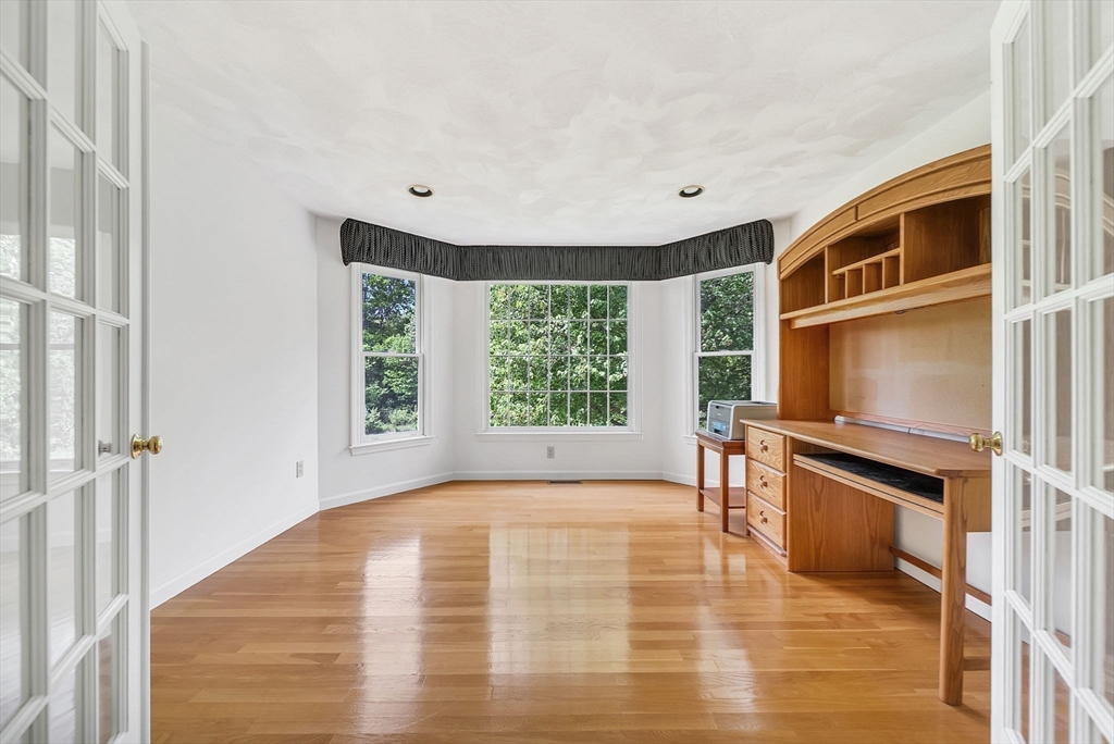 83 Jefferson Road Franklin, MA 02038 - Photo 4 of 34 a view of an empty room with a window