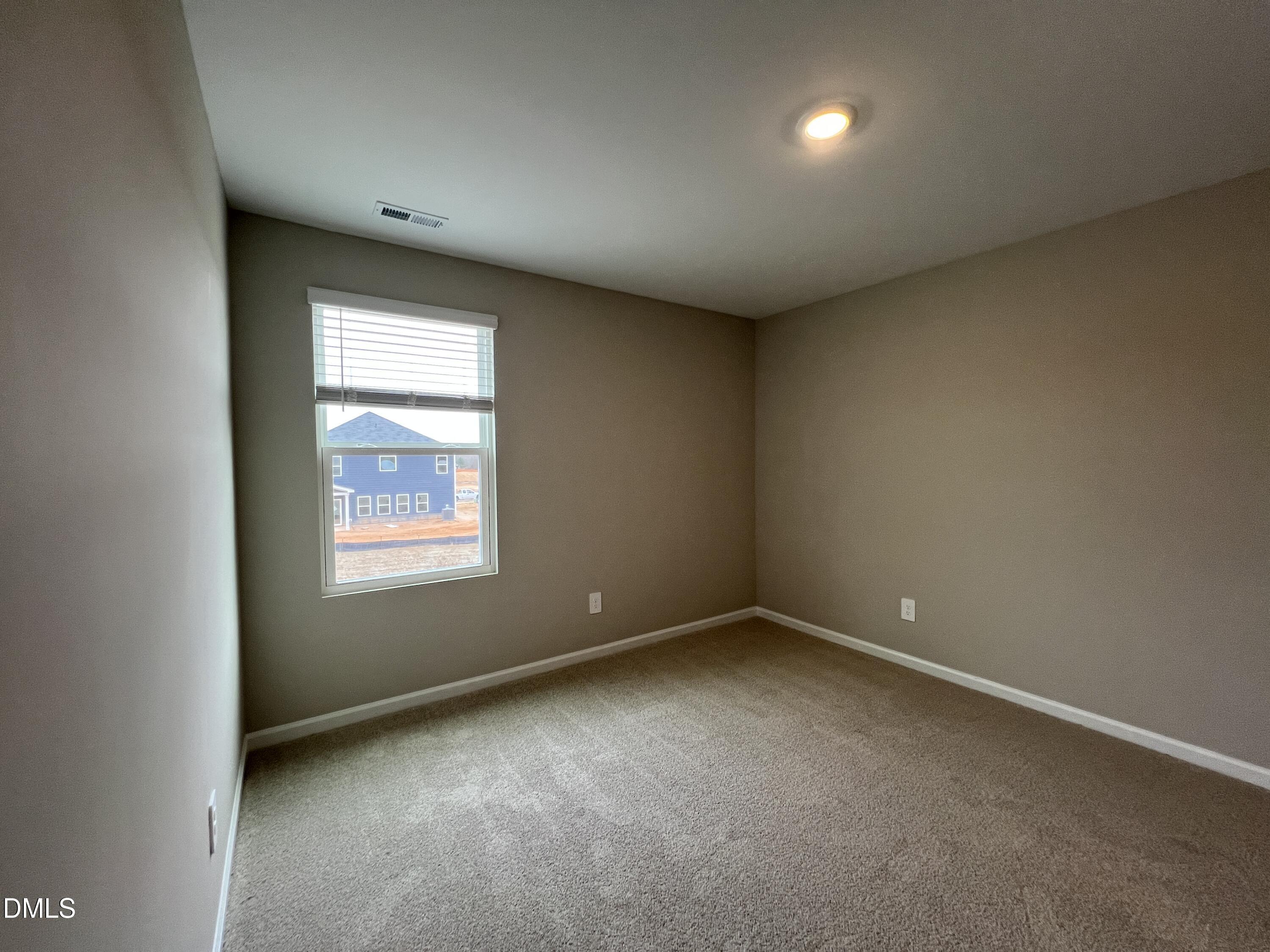 4036 Wesley Chapel Way Raleigh, NC 27616 - Photo 16 of 45 an empty room with a window