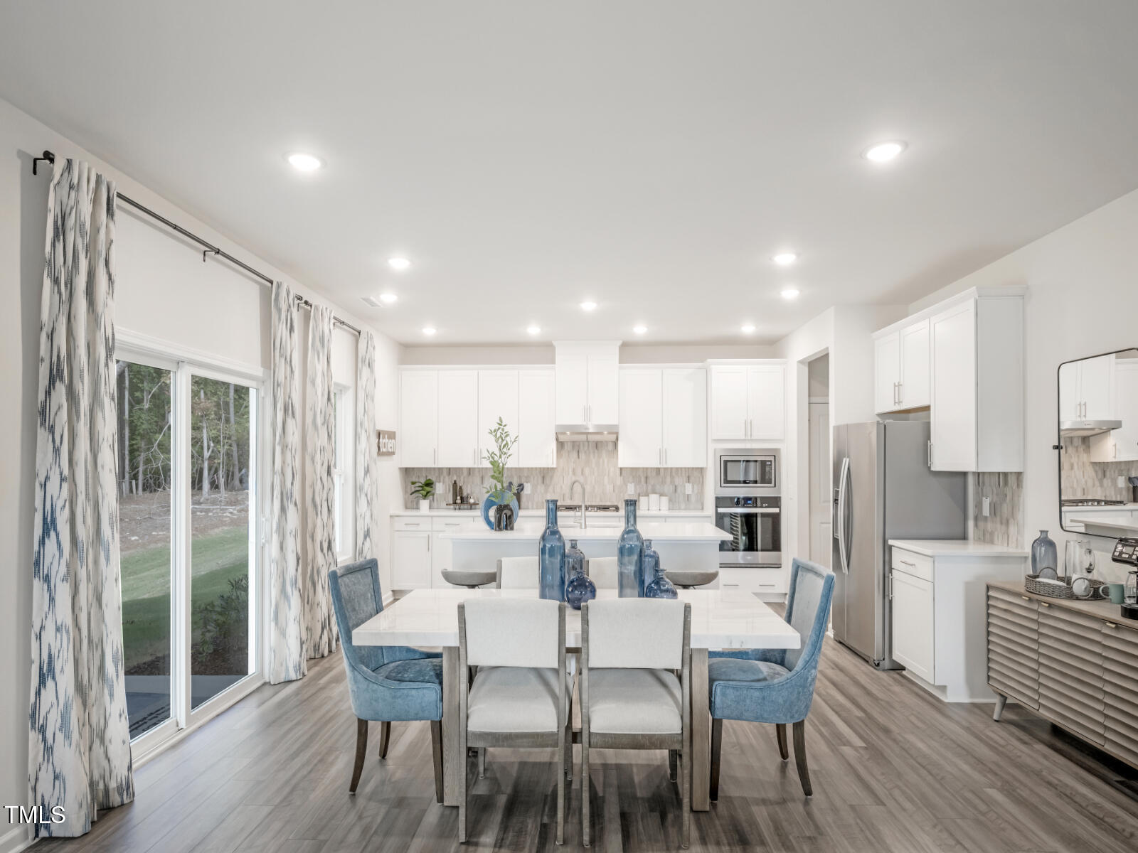 4036 Wesley Chapel Way Raleigh, NC 27616 - Photo 26 of 45 a view of a dining room with furniture window and wooden floor