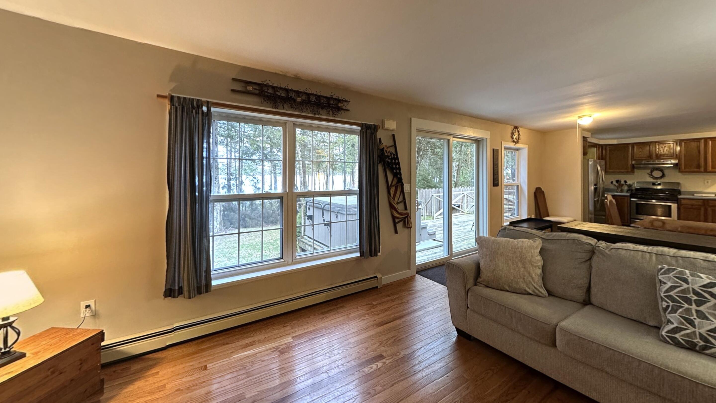 16 Maple Drive Northfield, ME 04654 - Photo 30 of 51 Living Room to Kitchen _ Dining