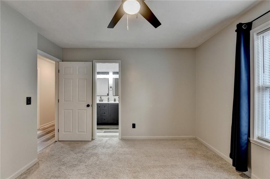 801 Davis Street Monroe, GA 30655 - Photo 26 of 33 a view of an empty room with a window