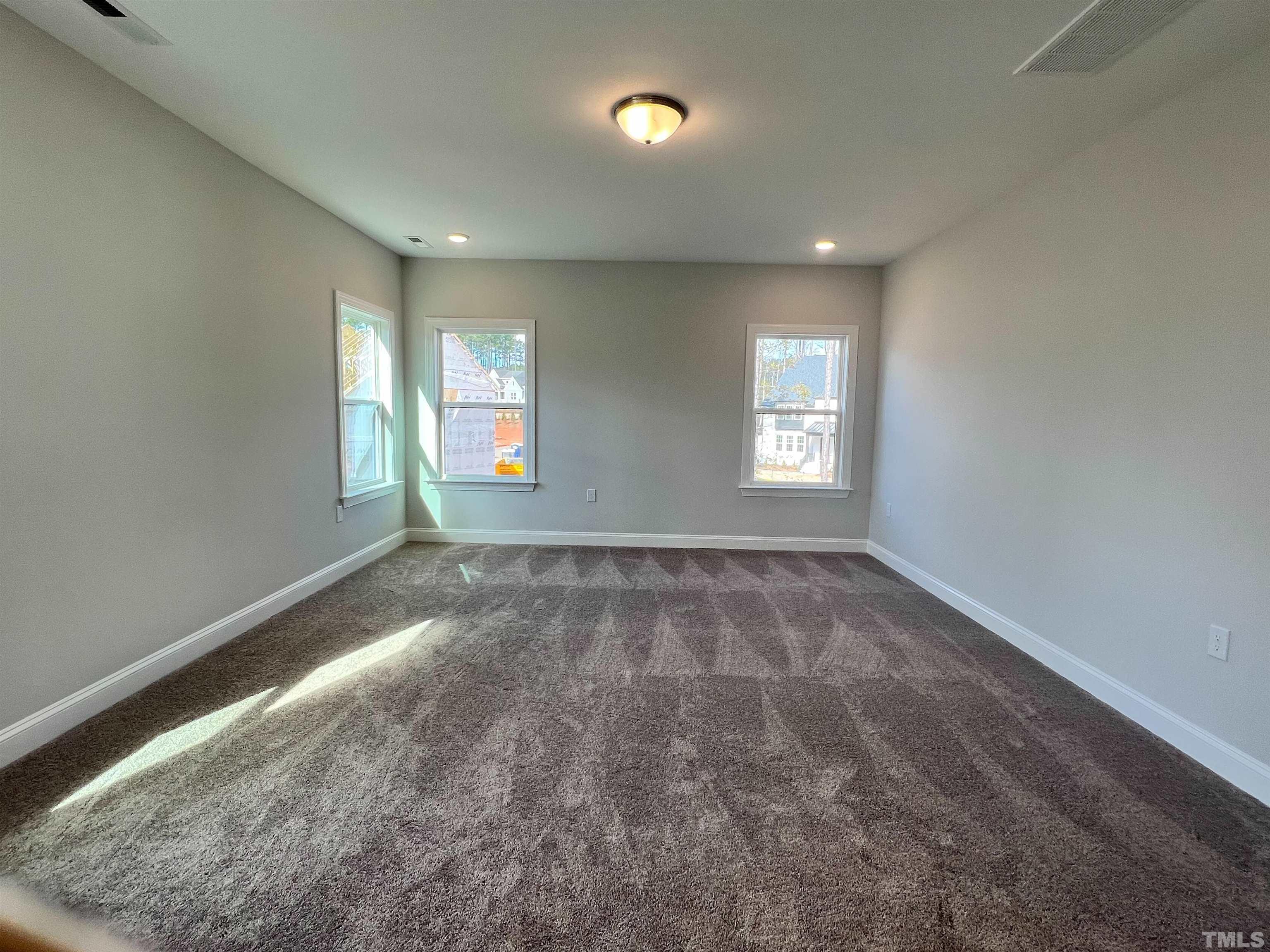 7613 Hasentree Way Wake Forest, NC 27587 - Photo 22 of 39 a view of empty room with window