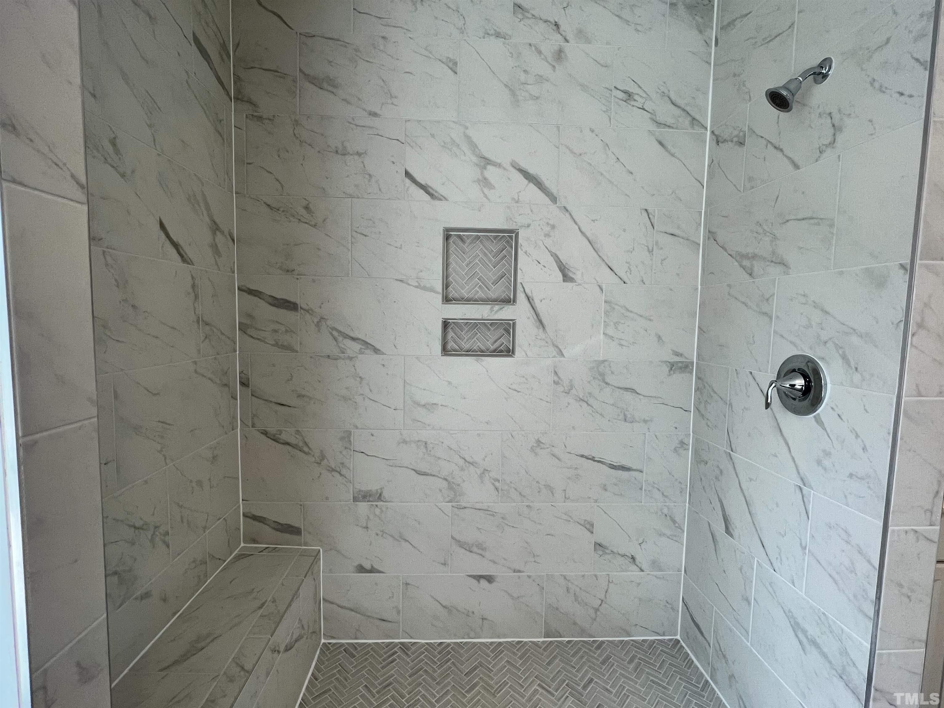 7613 Hasentree Way Wake Forest, NC 27587 - Photo 27 of 39 a bathroom with a shower