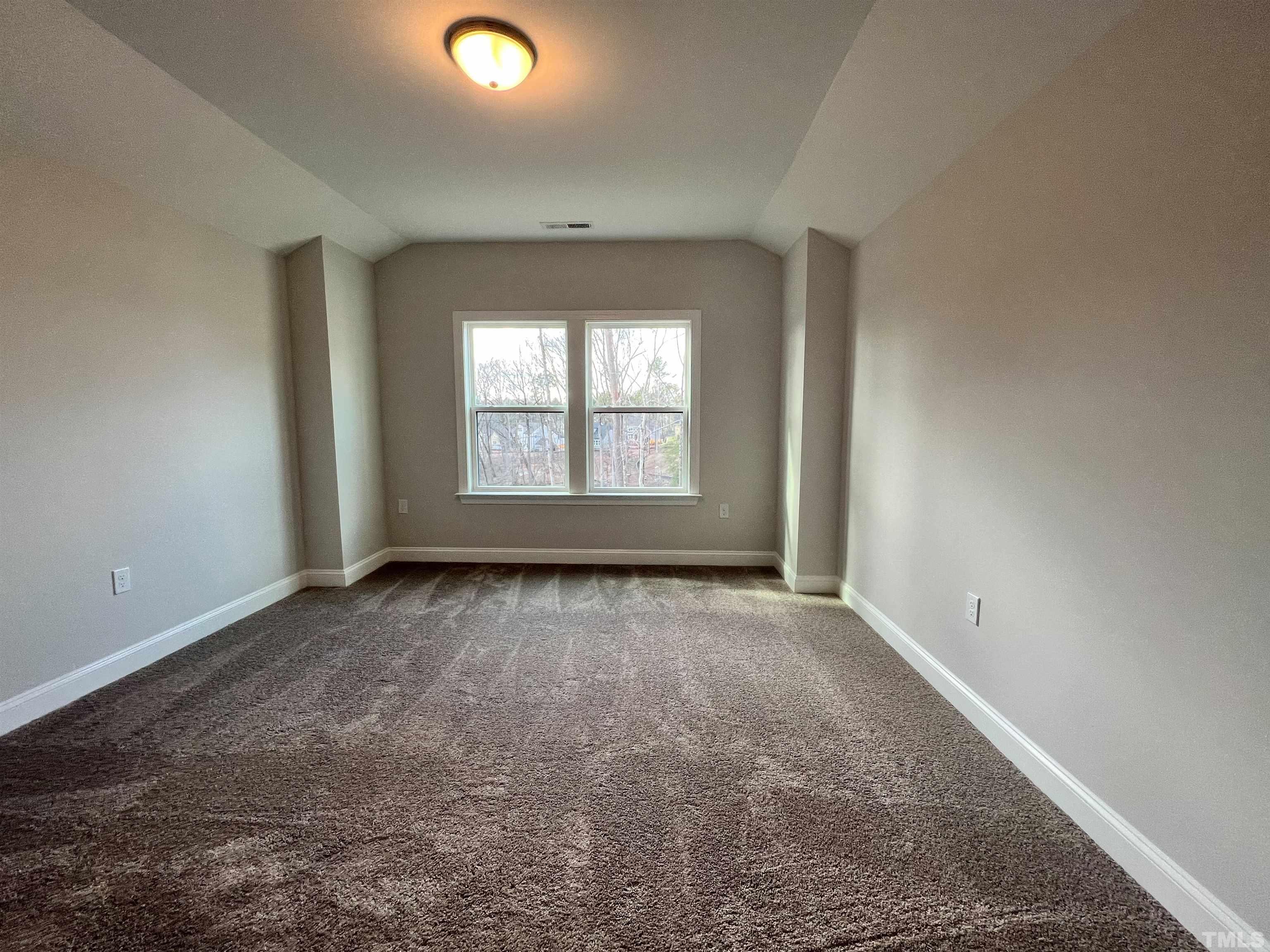 7613 Hasentree Way Wake Forest, NC 27587 - Photo 37 of 39 an empty room with windows