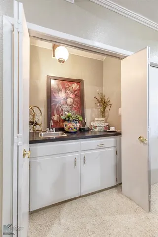 a bathroom with mirror and