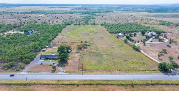 a view of a yard with an outdoor space