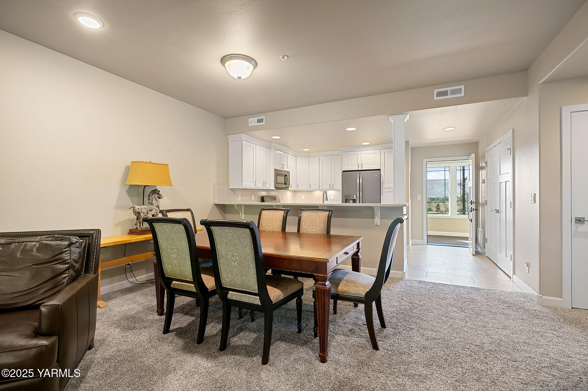 8905 Occidental Road, Unit 301A Yakima, WA 98903 - Photo 14 of 24 a dining room with furniture and window