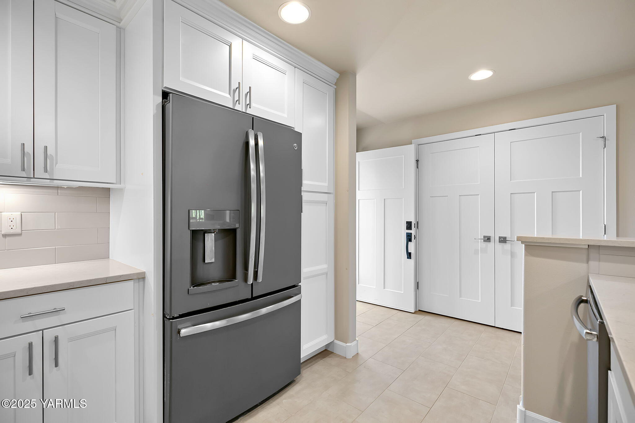 8905 Occidental Road, Unit 301A Yakima, WA 98903 - Photo 17 of 24 a kitchen with stainless steel appliances granite countertop a refrigerator and a sink