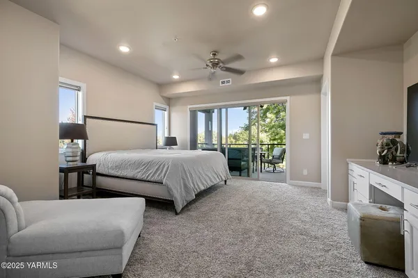 a bedroom with furniture and a fireplace