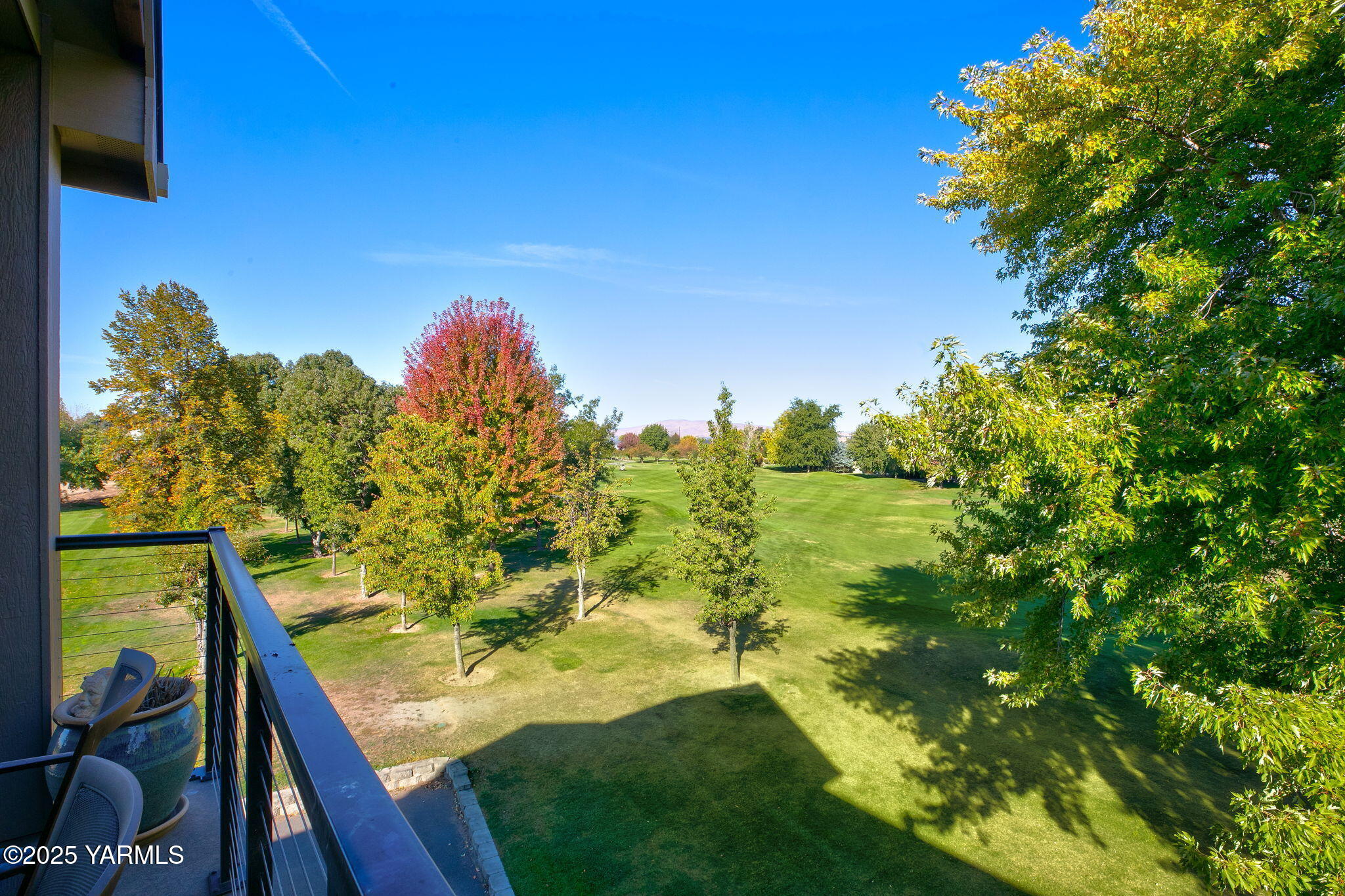 8905 Occidental Road, Unit 301A Yakima, WA 98903 - Photo 7 of 24 a view of a yard with an outdoor seating