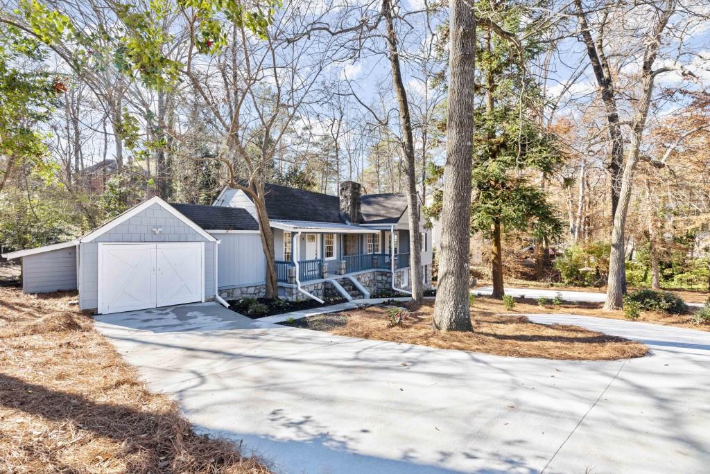 3310 East Roxboro Road Northeast Atlanta, GA 30324 - Photo 4 of 47 a view of a house with snow on the background