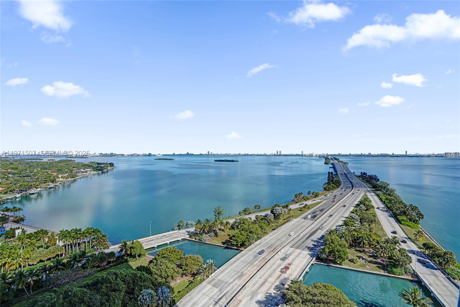 601 Northeast 36th Street, Unit 1908 Miami, FL 33137 - Photo 30 of 57 an aerial view of a houses with a lake view