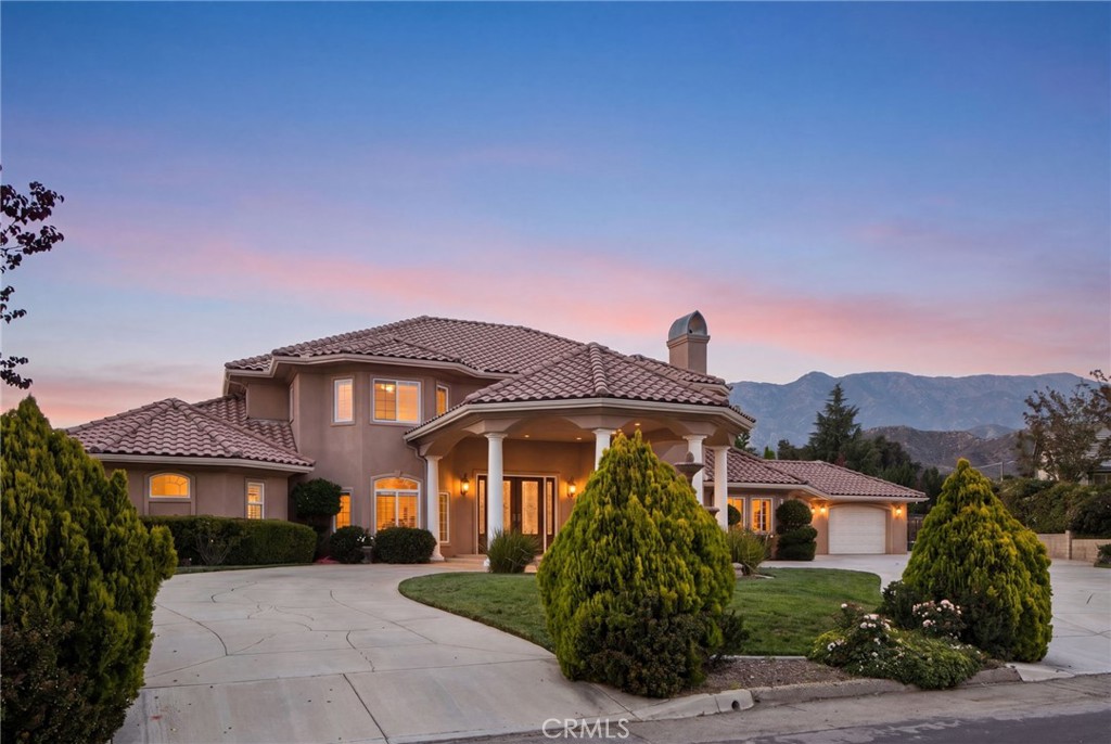 38136 Butterfly Court Yucaipa, CA 92399 - Photo 2 of 71 a front view of a house with a yard